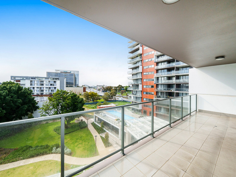 Sun-Soaked Balcony With Poolside Views!